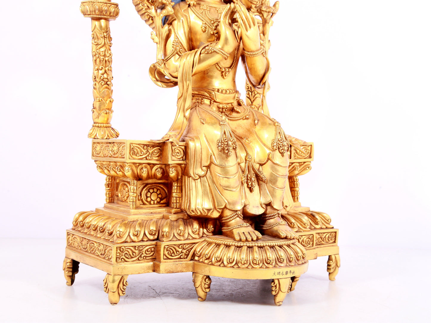 A solemn gilt bronze statue of Bodhisattva