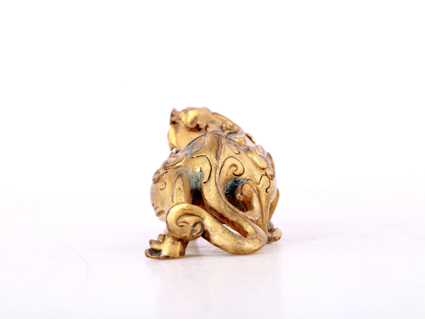 An exquisite gilt copper auspicious animal ornament