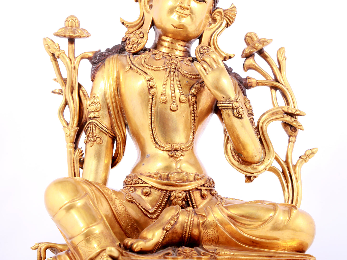 A solemn gilt copper green tara