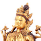 A solemn gilt copper green tara