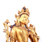 A solemn gilt copper green tara