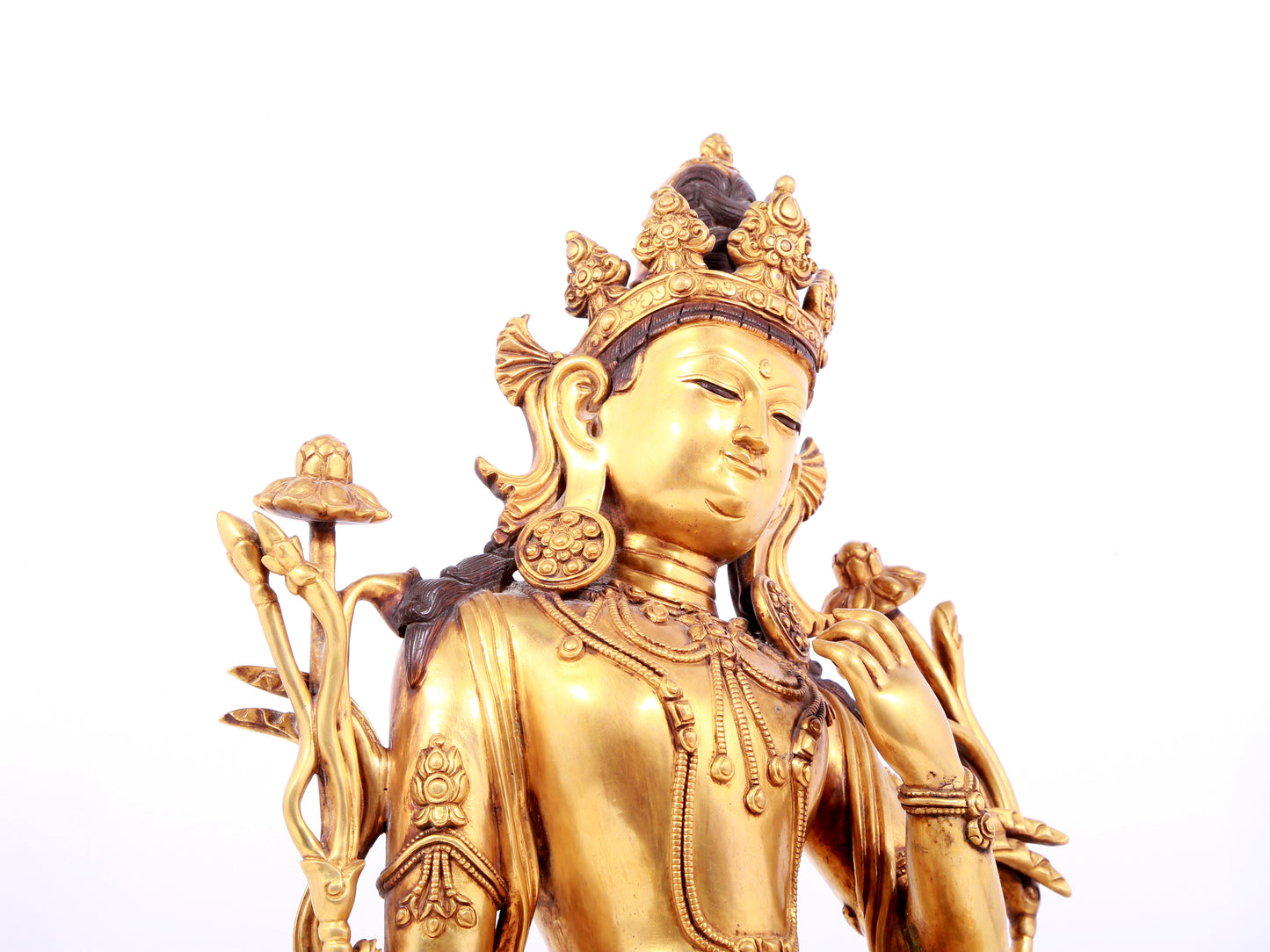 A solemn gilt copper green tara