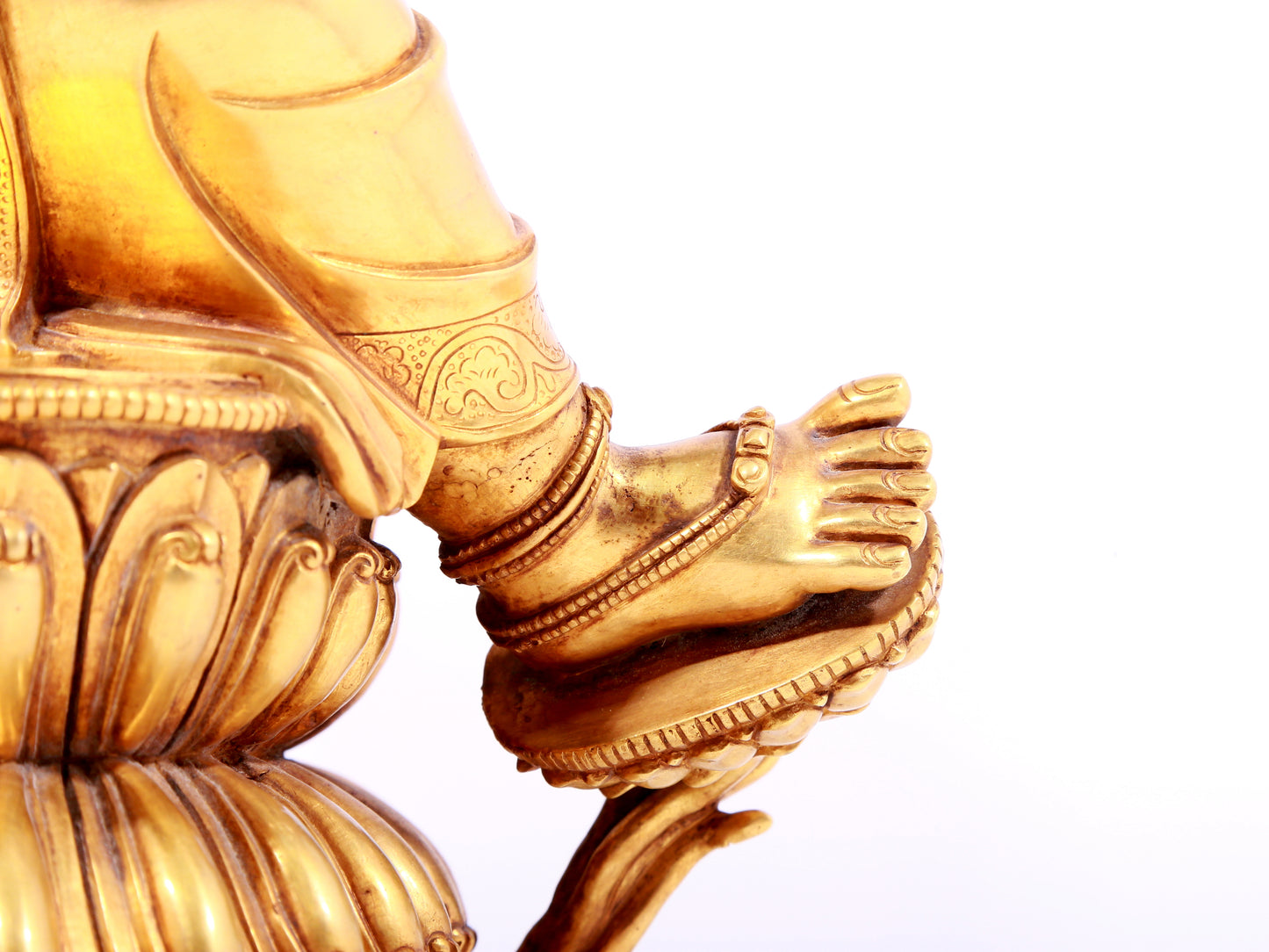 A solemn gilt copper green tara