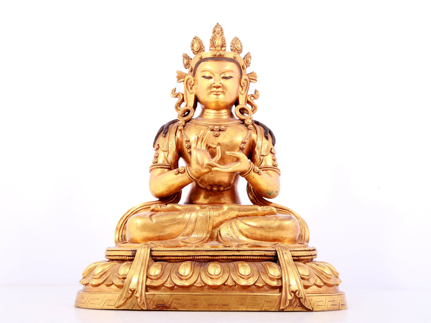 A solemn gilt bronze statue of Bodhisattva