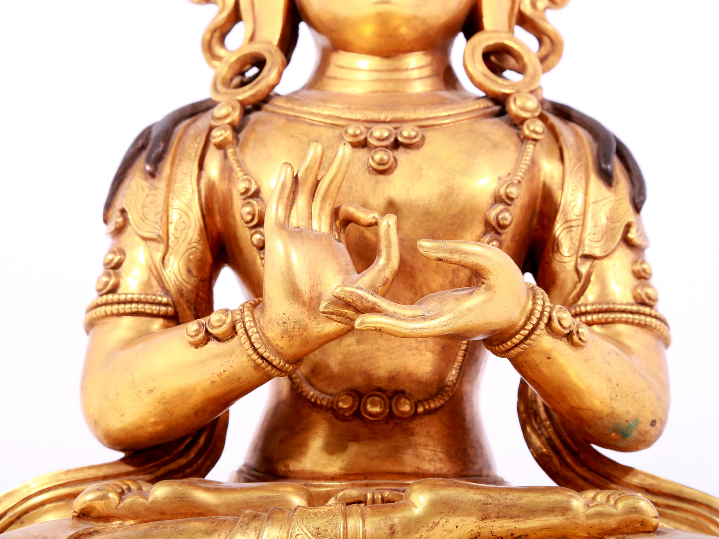 A solemn gilt bronze statue of Bodhisattva