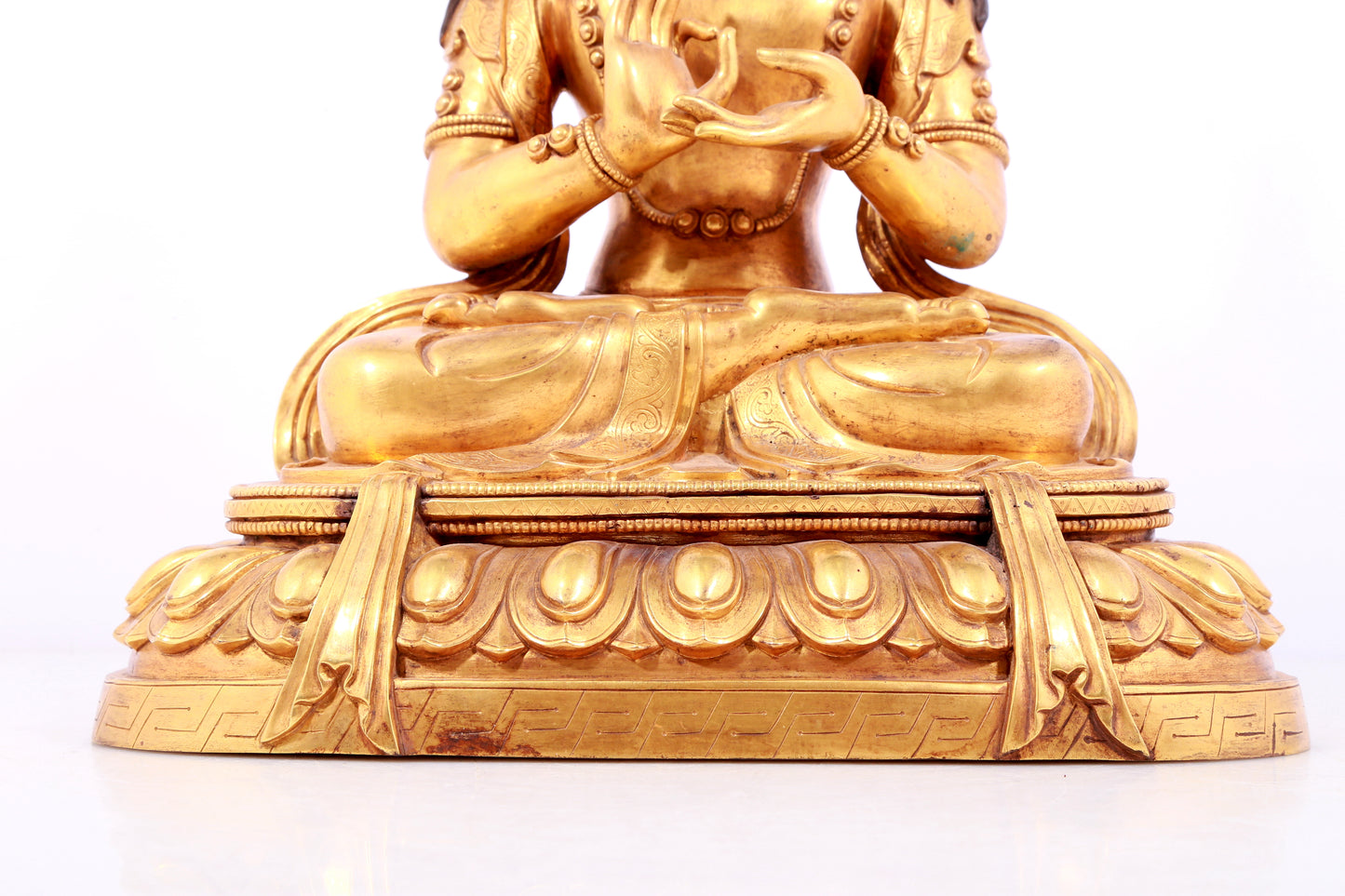 A solemn gilt bronze statue of Bodhisattva