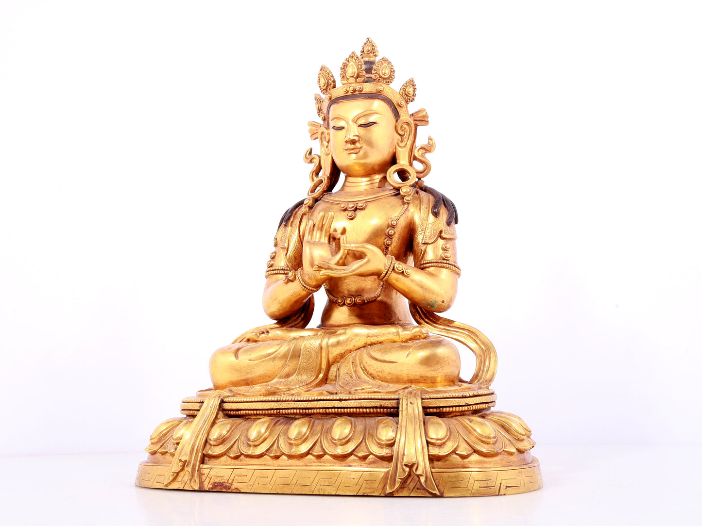 A solemn gilt bronze statue of Bodhisattva