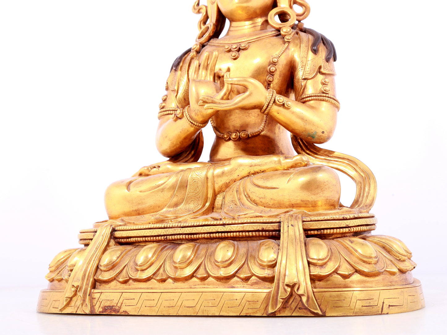 A solemn gilt bronze statue of Bodhisattva