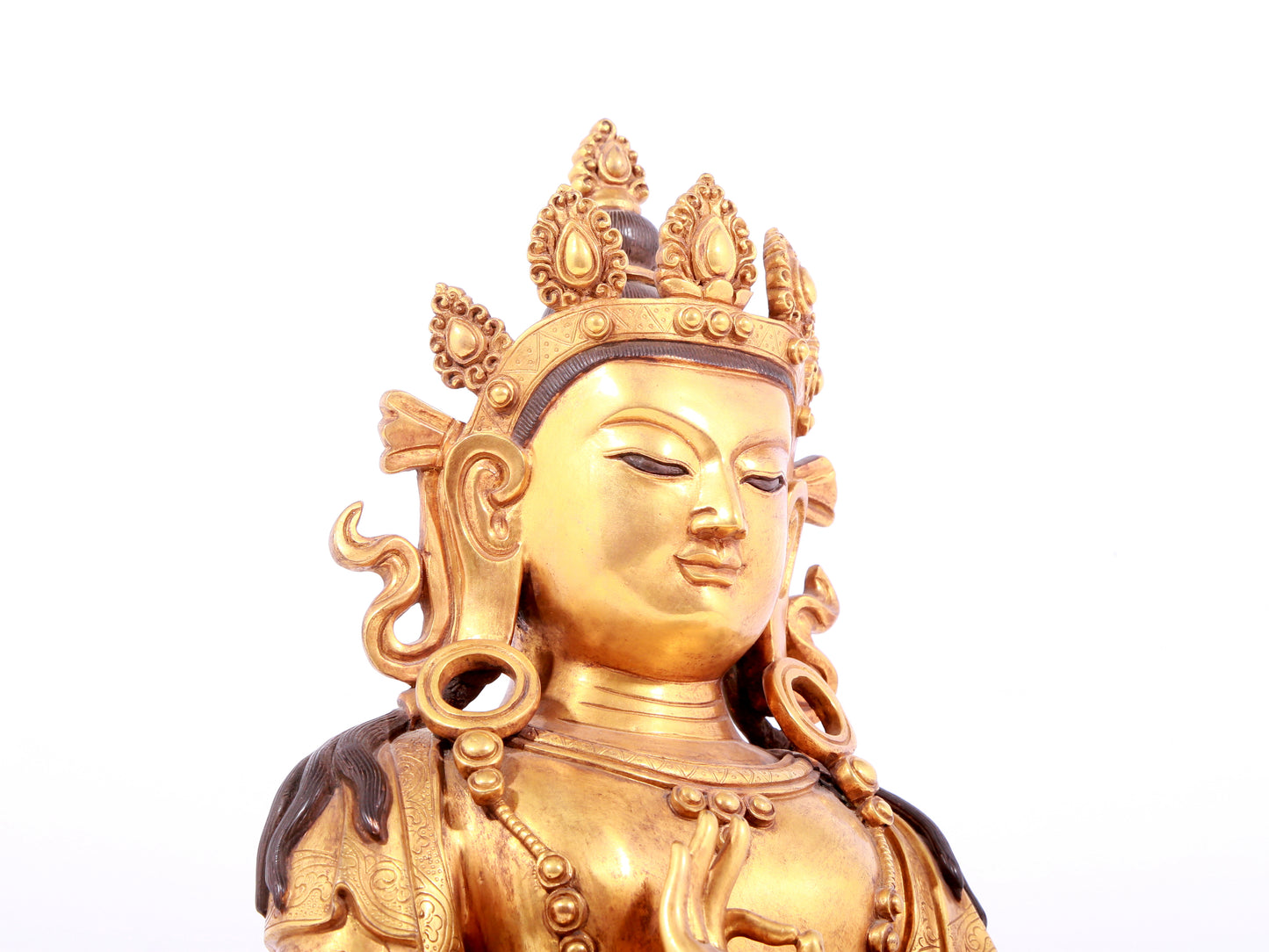 A solemn gilt bronze statue of Bodhisattva