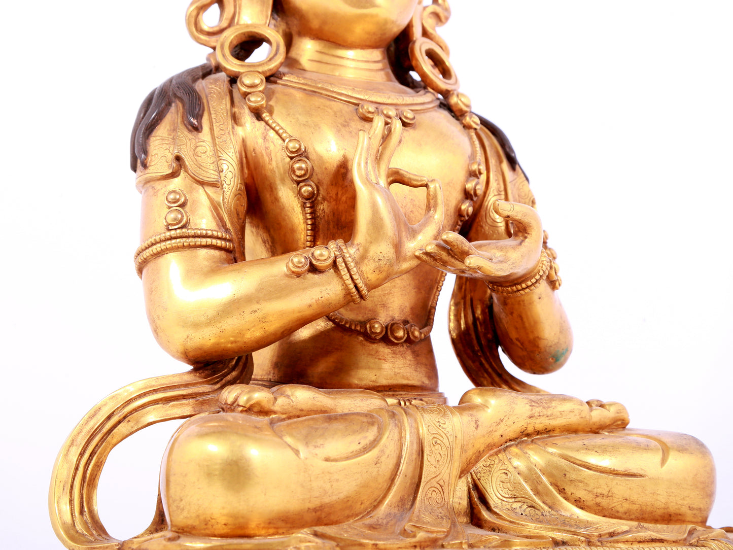 A solemn gilt bronze statue of Bodhisattva