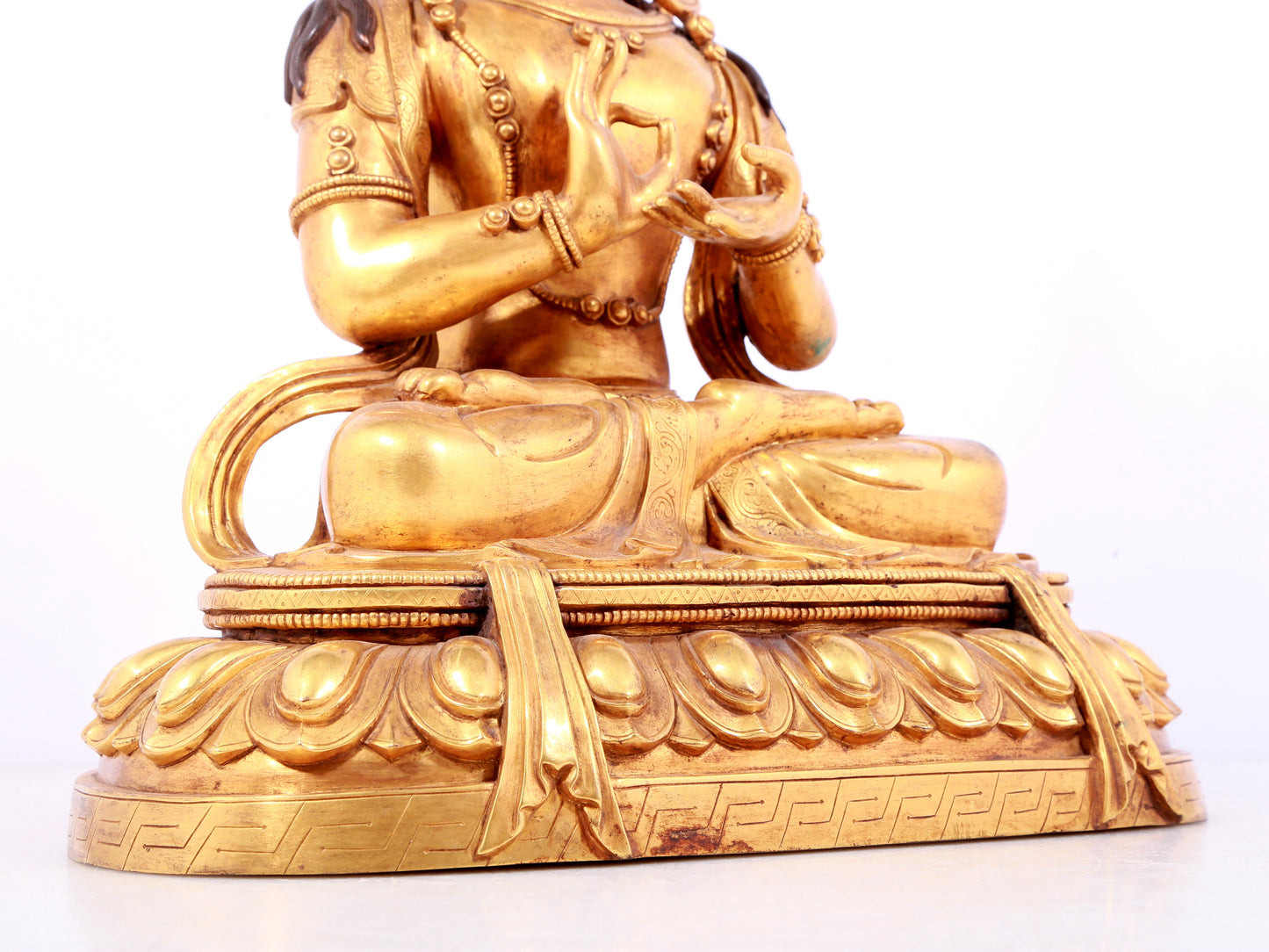 A solemn gilt bronze statue of Bodhisattva