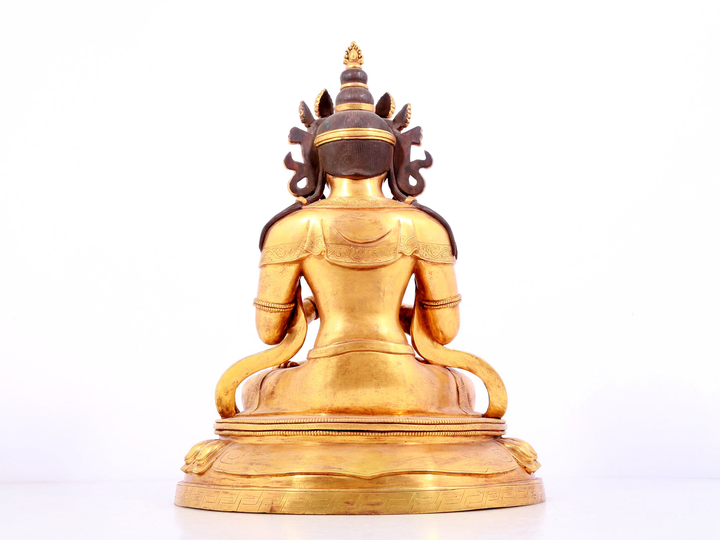 A solemn gilt bronze statue of Bodhisattva