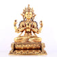 A solemn gilt bronze statue of Guanyin with four arms inlaid gems