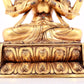 A solemn gilt bronze statue of Guanyin with four arms inlaid gems