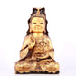 A solemn gilt bronze statue of Guanyin