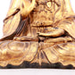 A solemn gilt bronze statue of Guanyin