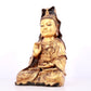 A solemn gilt bronze statue of Guanyin