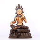 A solemn gilt bronze statue of green Tara