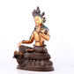 A solemn gilt bronze statue of green Tara