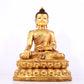 A solemn gilt bronze statue of Sakyamuni