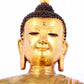 A solemn gilt bronze statue of Sakyamuni