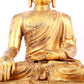 A solemn gilt bronze statue of Sakyamuni