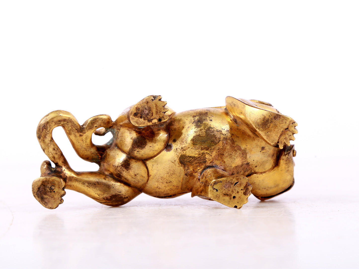 An exquisite gilt copper auspicious animal ornament