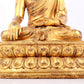 A solemn gilt bronze statue of Sakyamuni