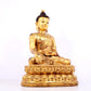 A solemn gilt bronze statue of Sakyamuni