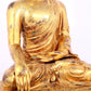 A solemn gilt bronze statue of Sakyamuni