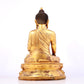 A solemn gilt bronze statue of Sakyamuni