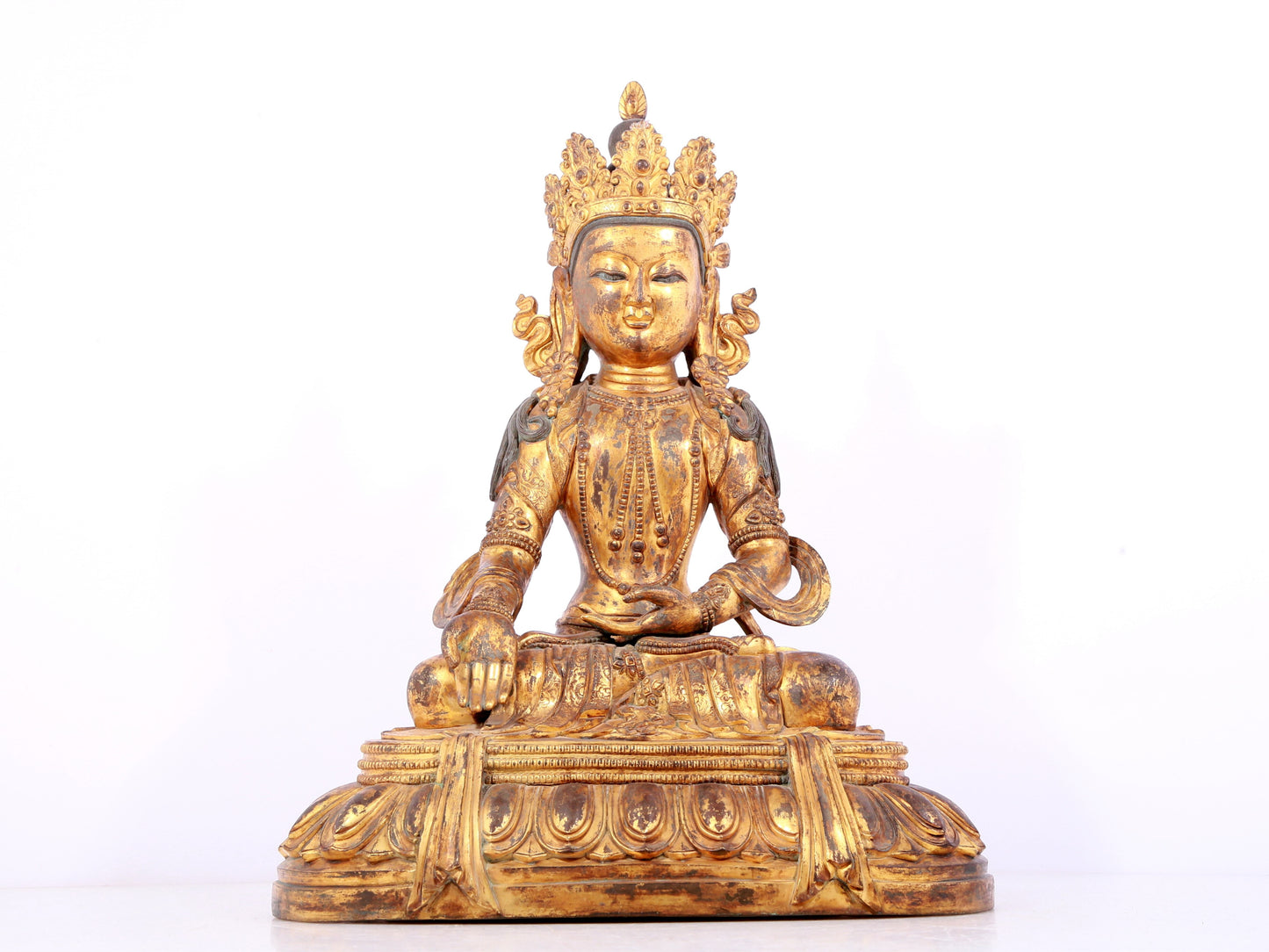 A solemn gilt bronze statue of Bodhisattva