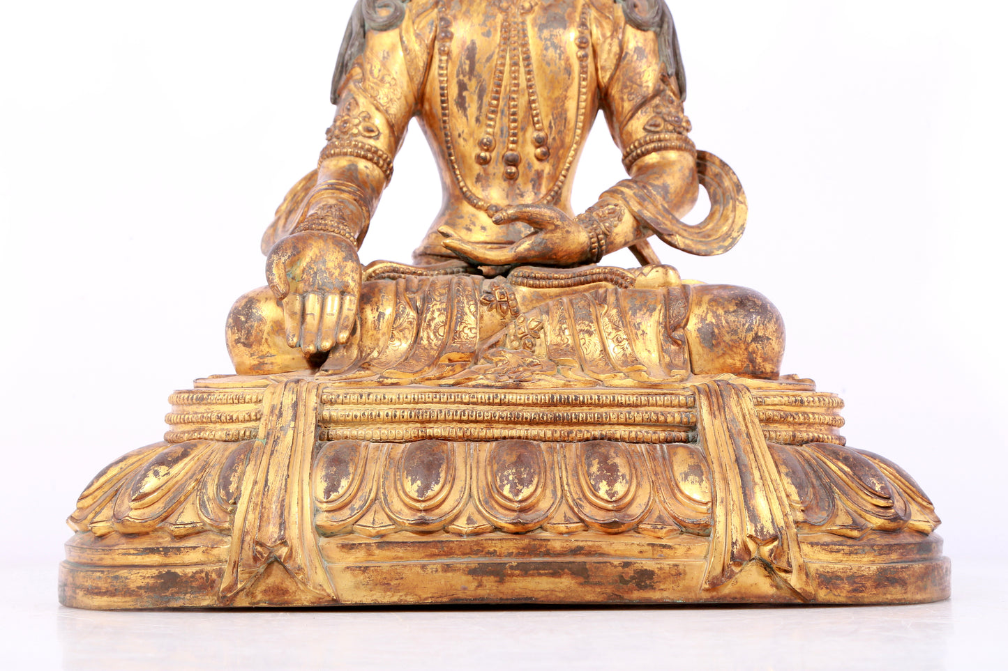 A solemn gilt bronze statue of Bodhisattva