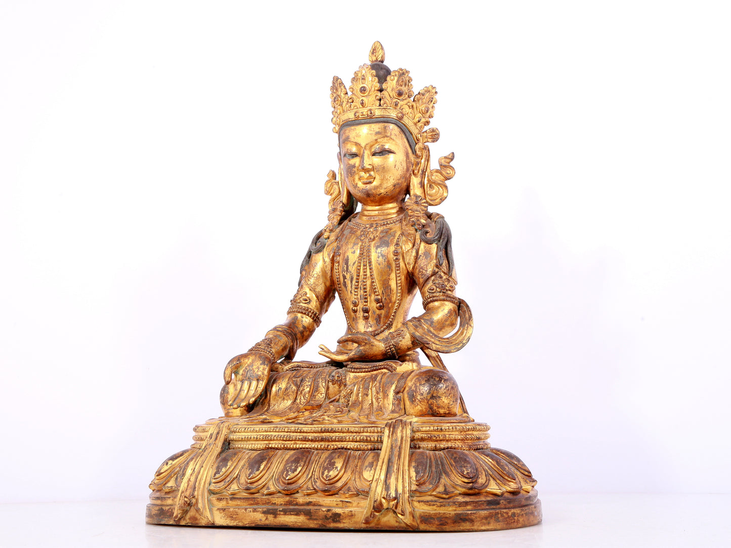 A solemn gilt bronze statue of Bodhisattva