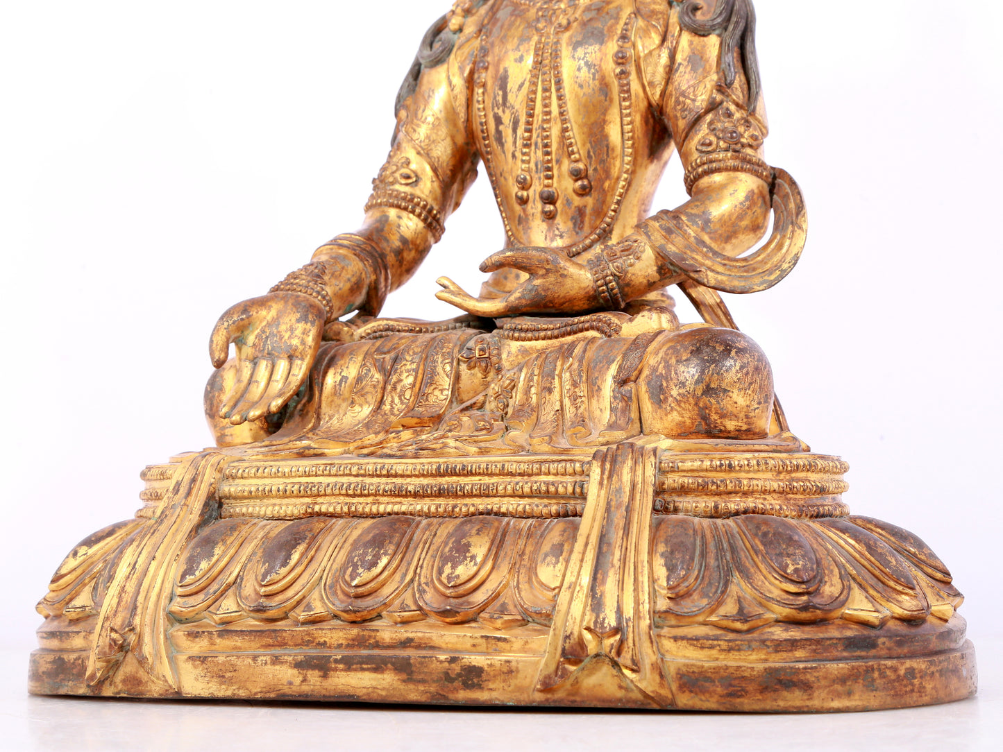 A solemn gilt bronze statue of Bodhisattva