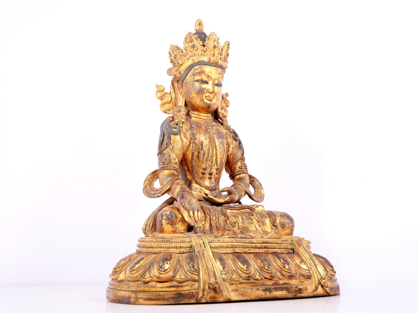 A solemn gilt bronze statue of Bodhisattva