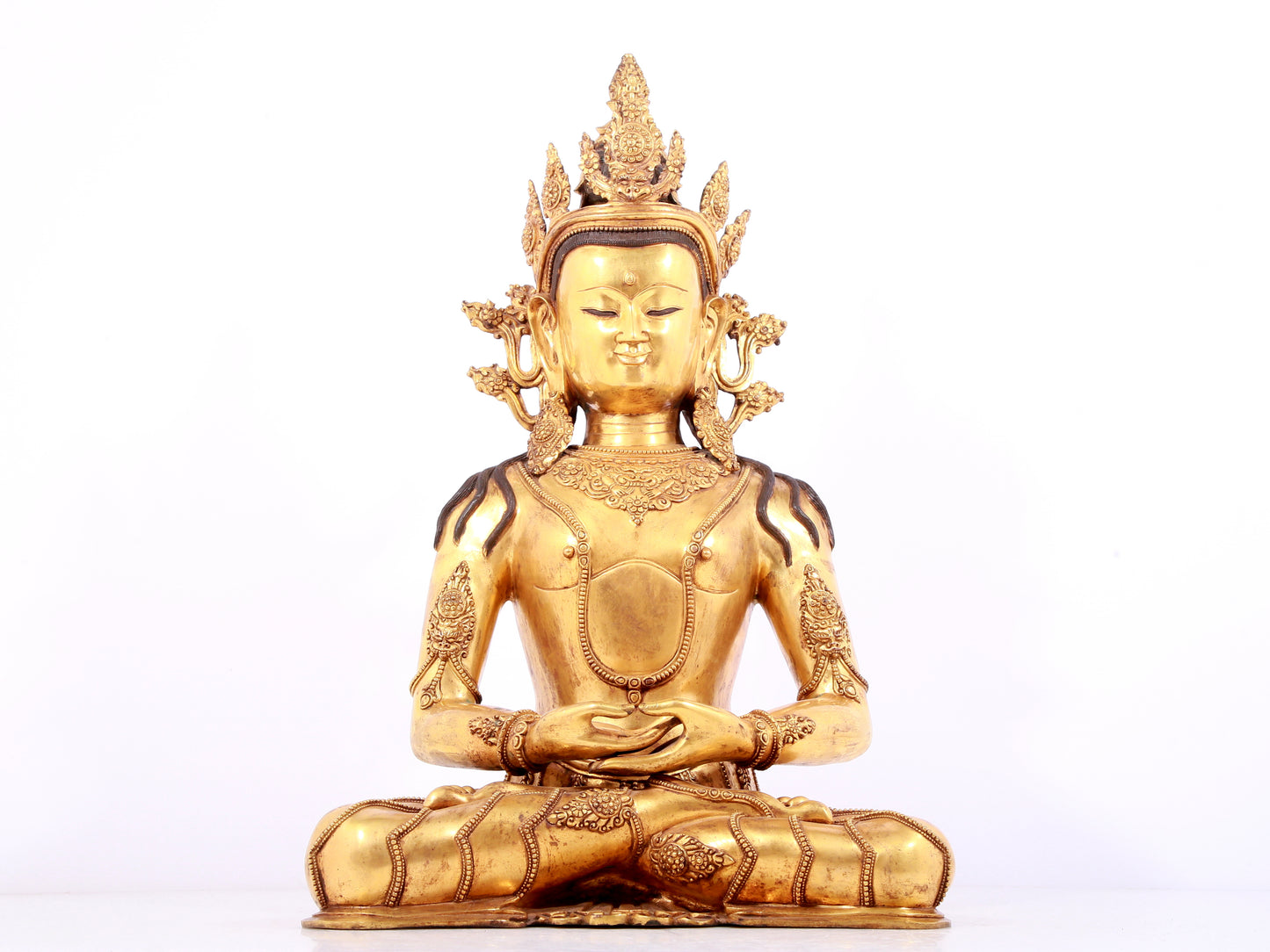 A solemn gilt bronze statue of Bodhisattva