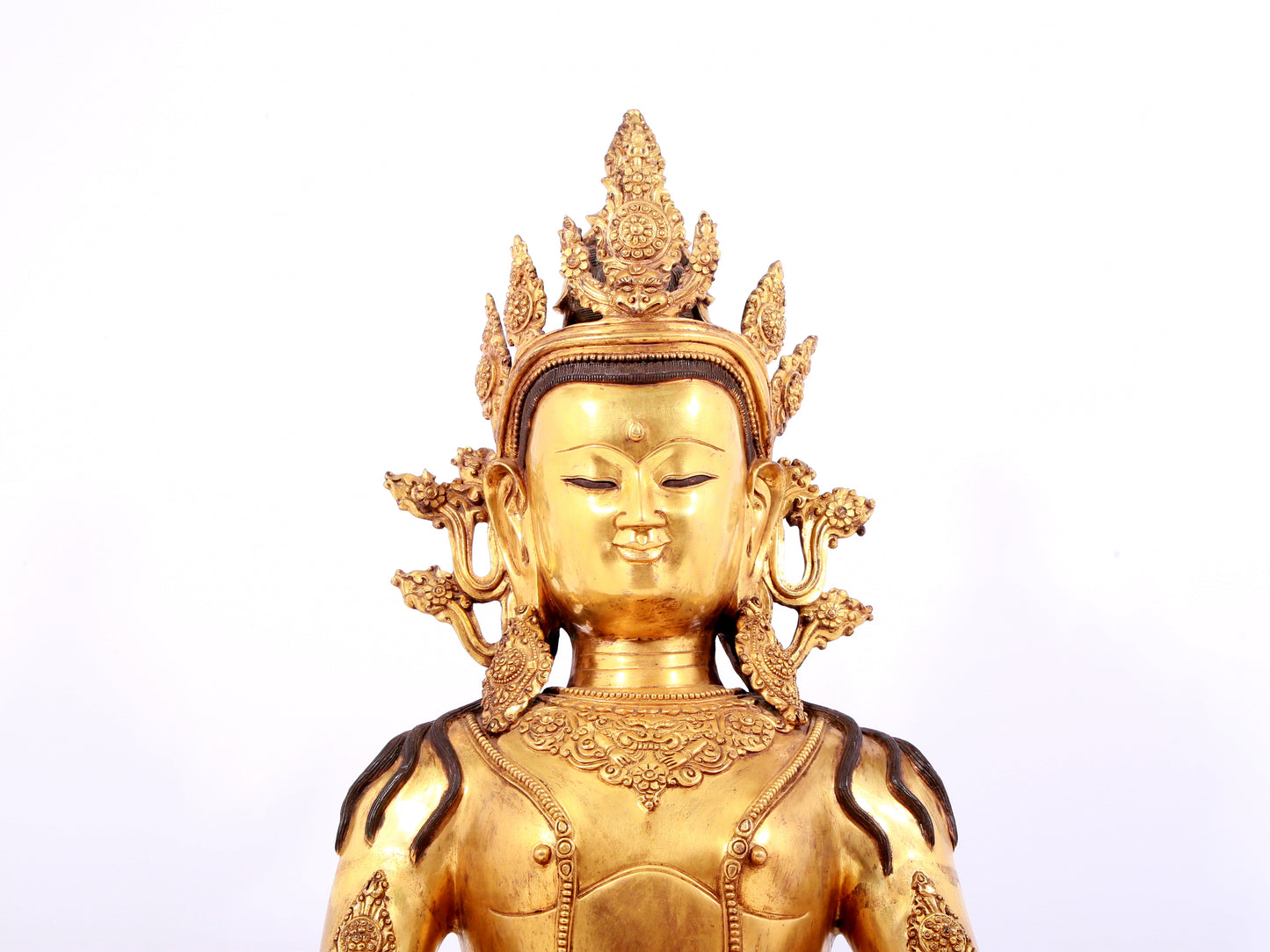 A solemn gilt bronze statue of Bodhisattva