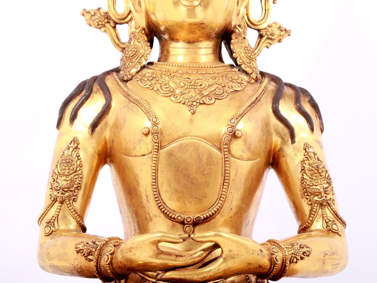 A solemn gilt bronze statue of Bodhisattva