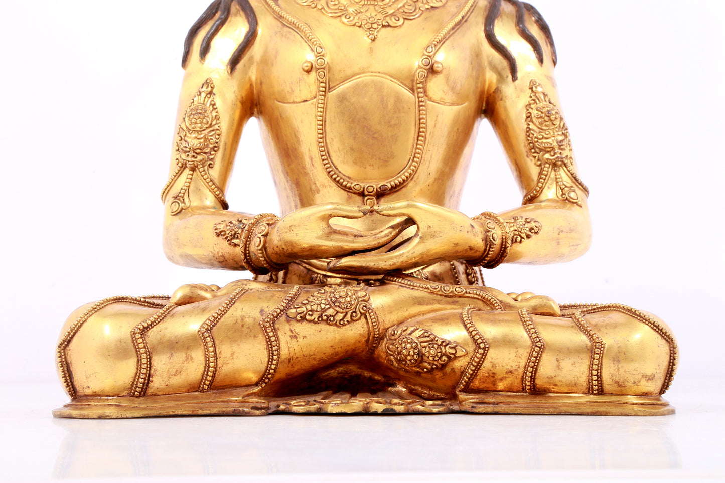 A solemn gilt bronze statue of Bodhisattva