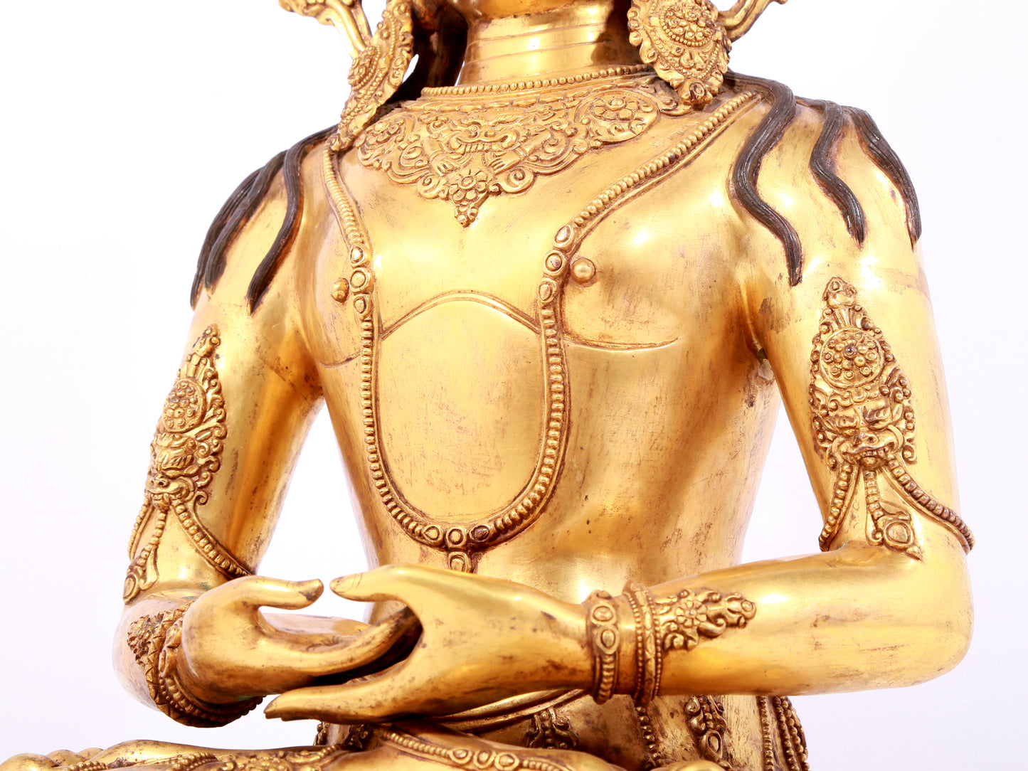 A solemn gilt bronze statue of Bodhisattva