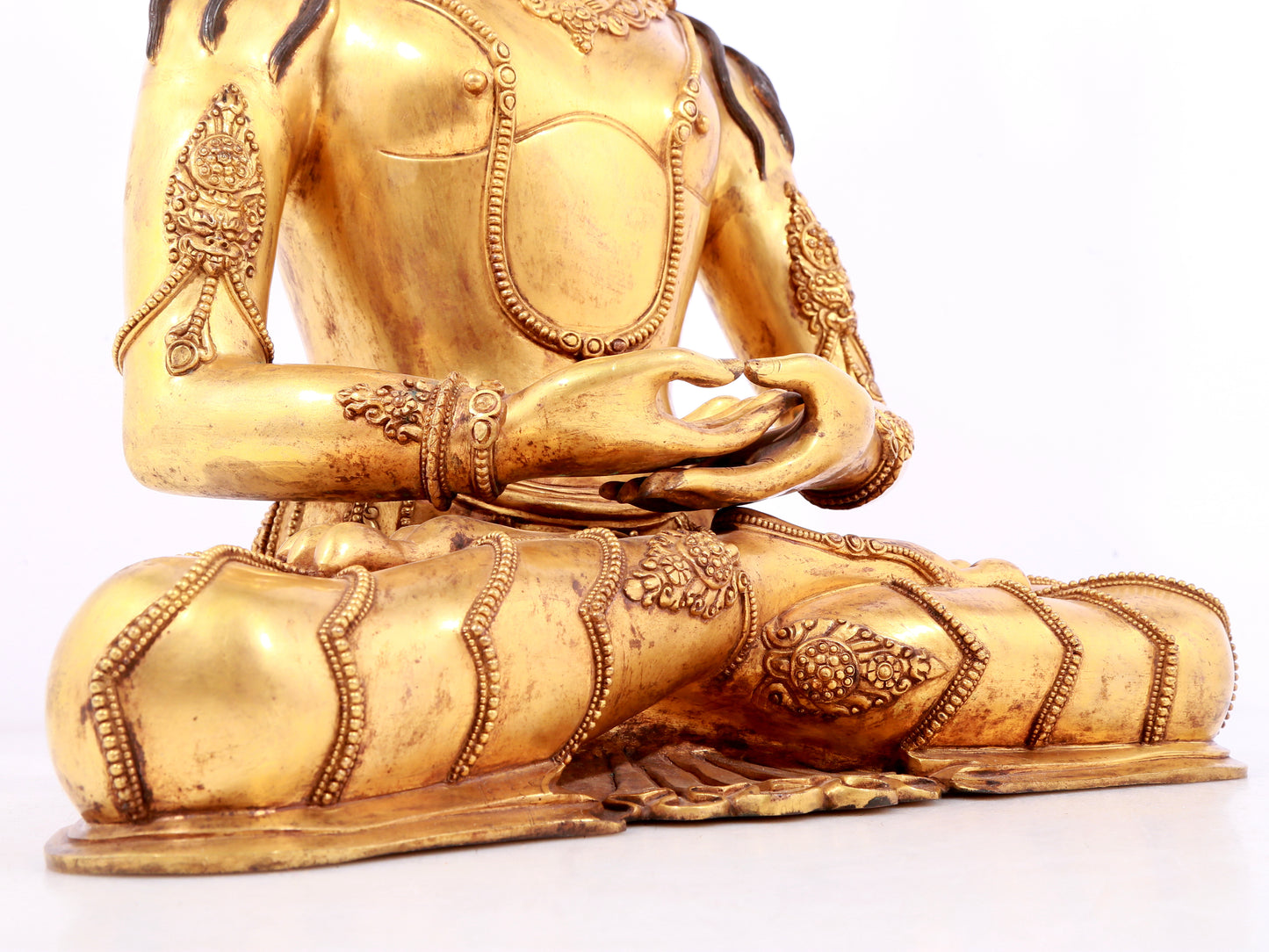 A solemn gilt bronze statue of Bodhisattva