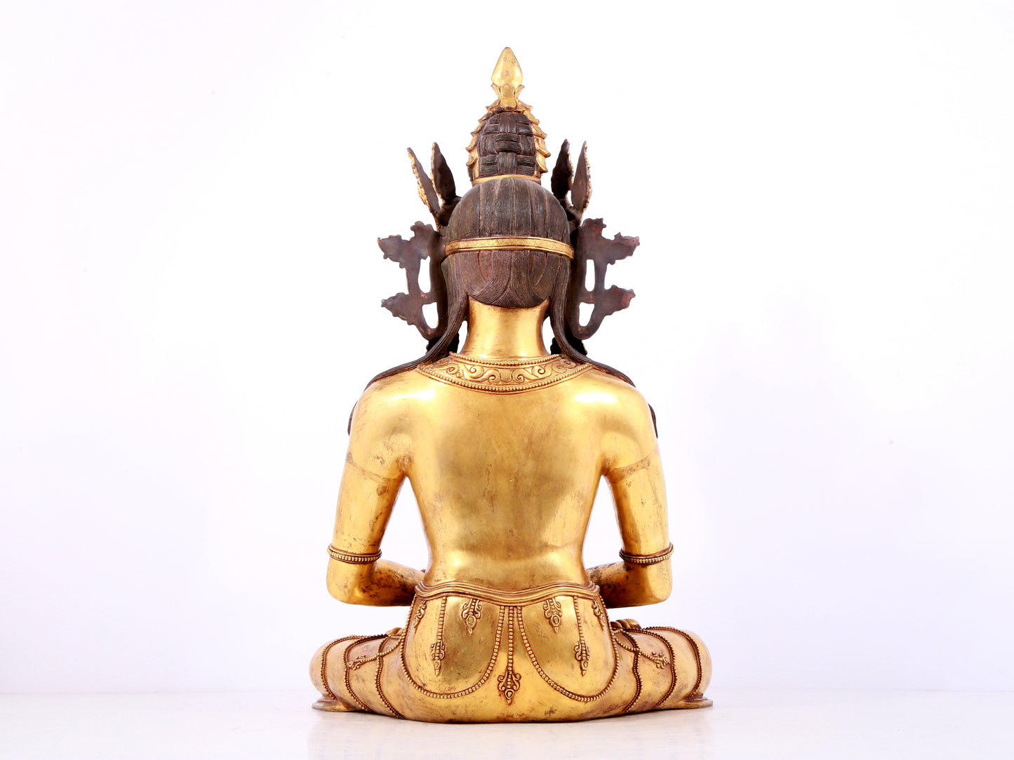 A solemn gilt bronze statue of Bodhisattva