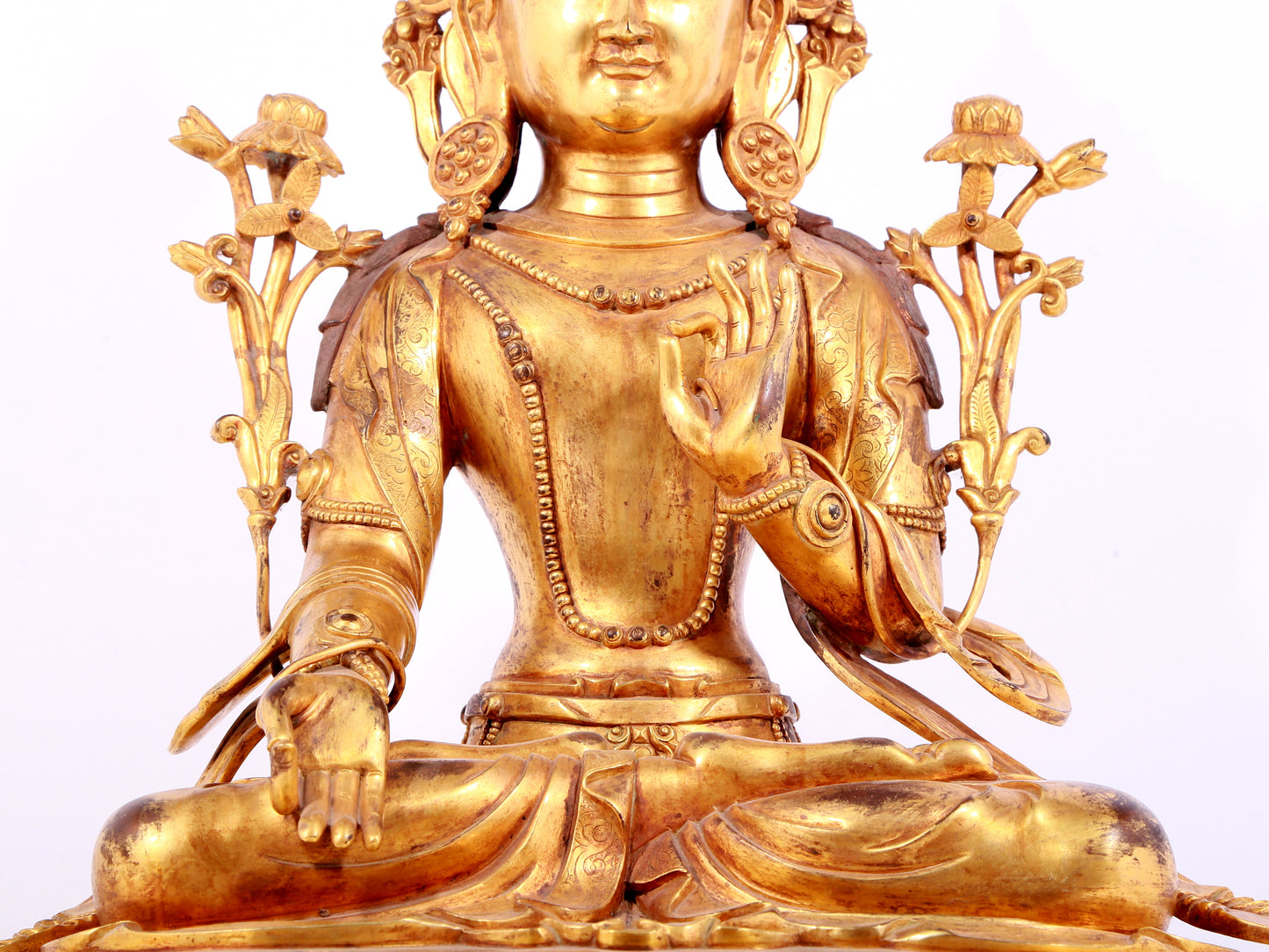 A solemn gilt bronze statue of Bodhisattva