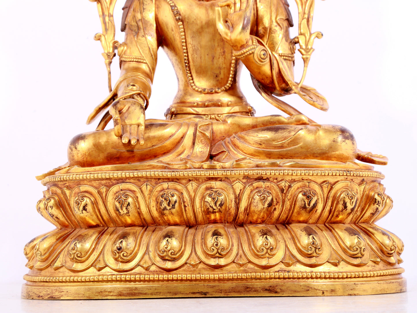 A solemn gilt bronze statue of Bodhisattva