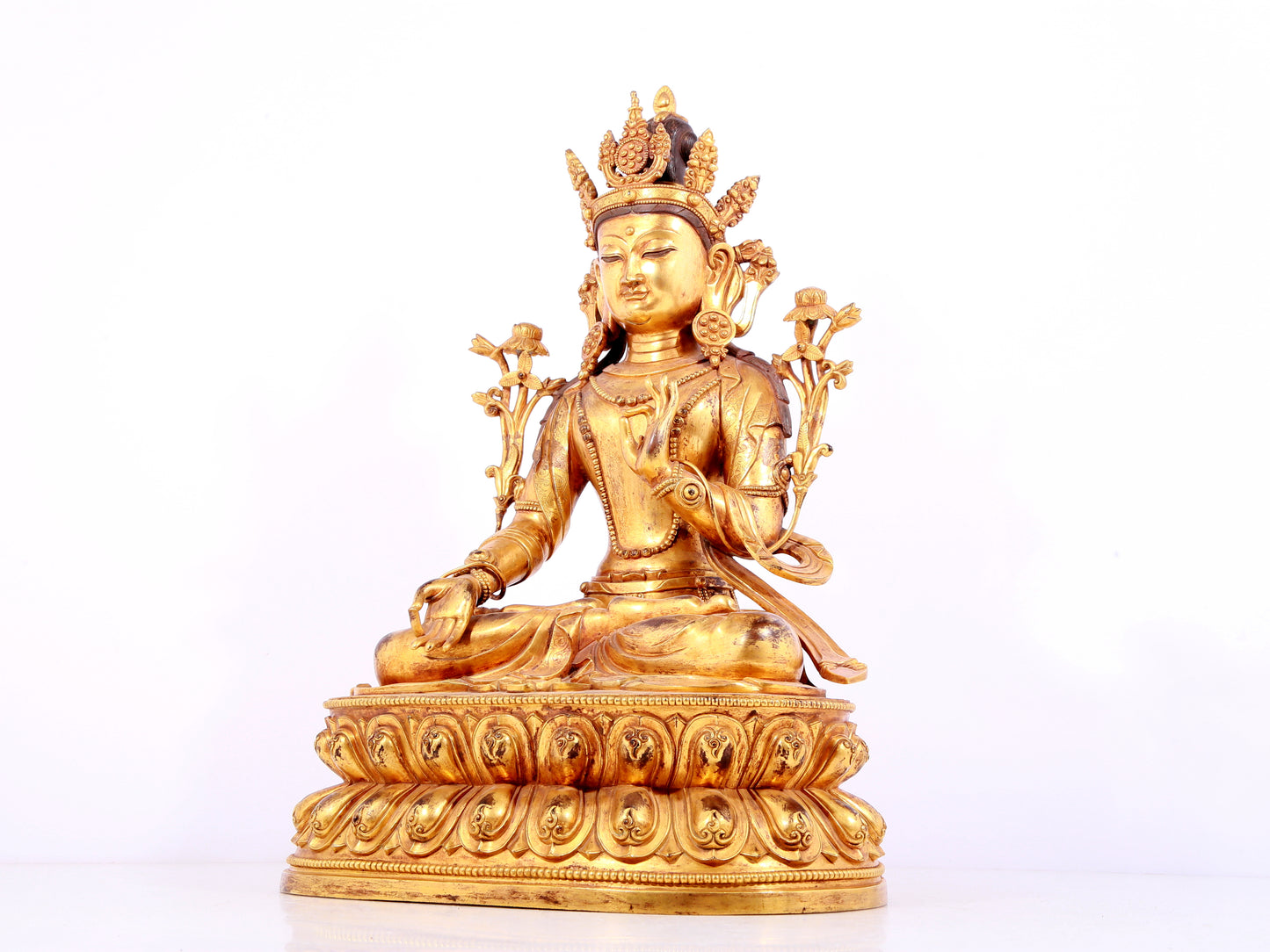 A solemn gilt bronze statue of Bodhisattva