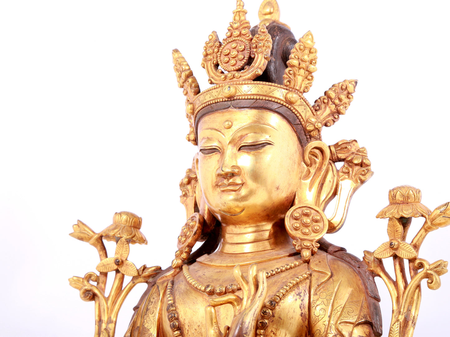 A solemn gilt bronze statue of Bodhisattva