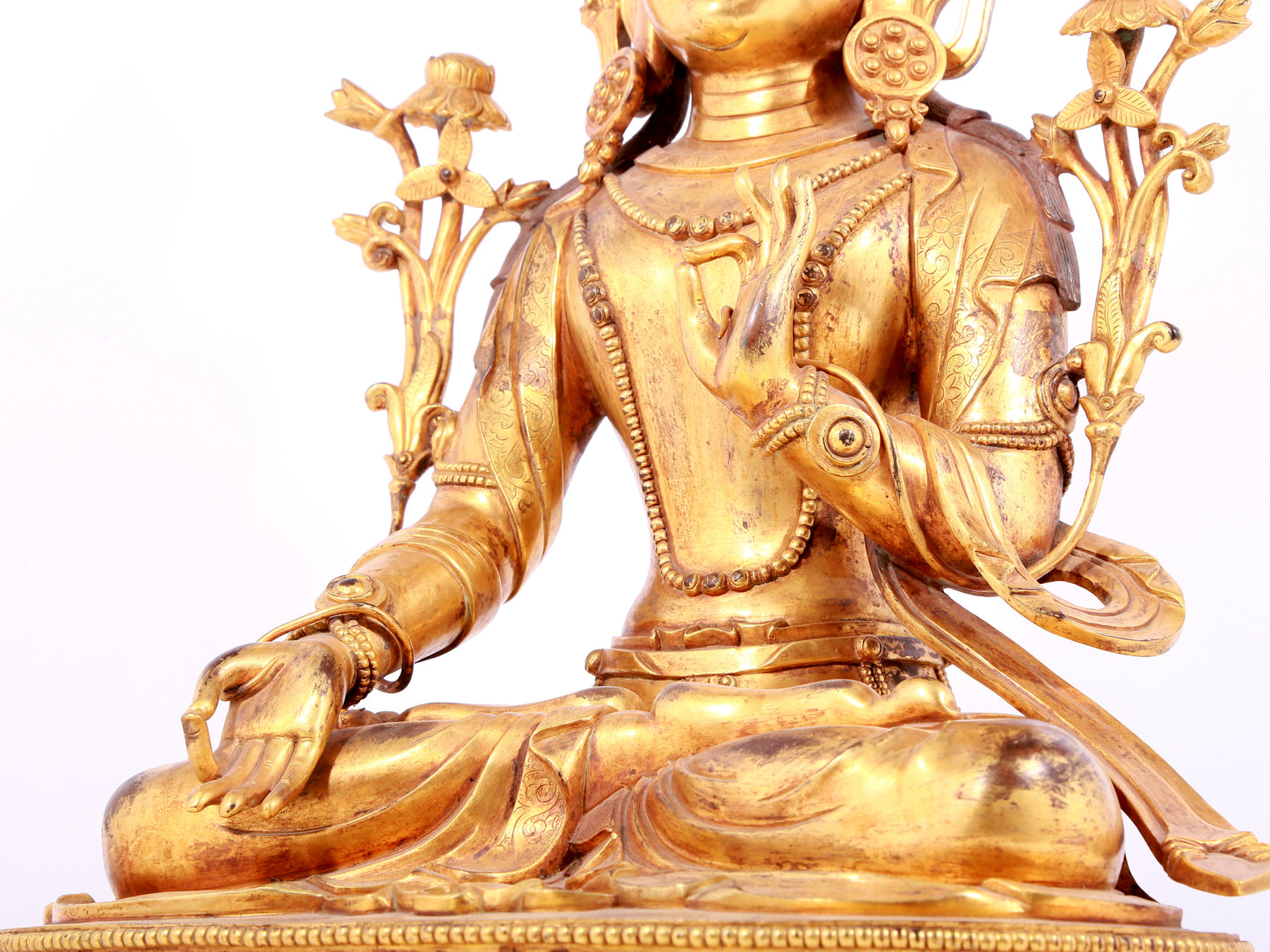 A solemn gilt bronze statue of Bodhisattva