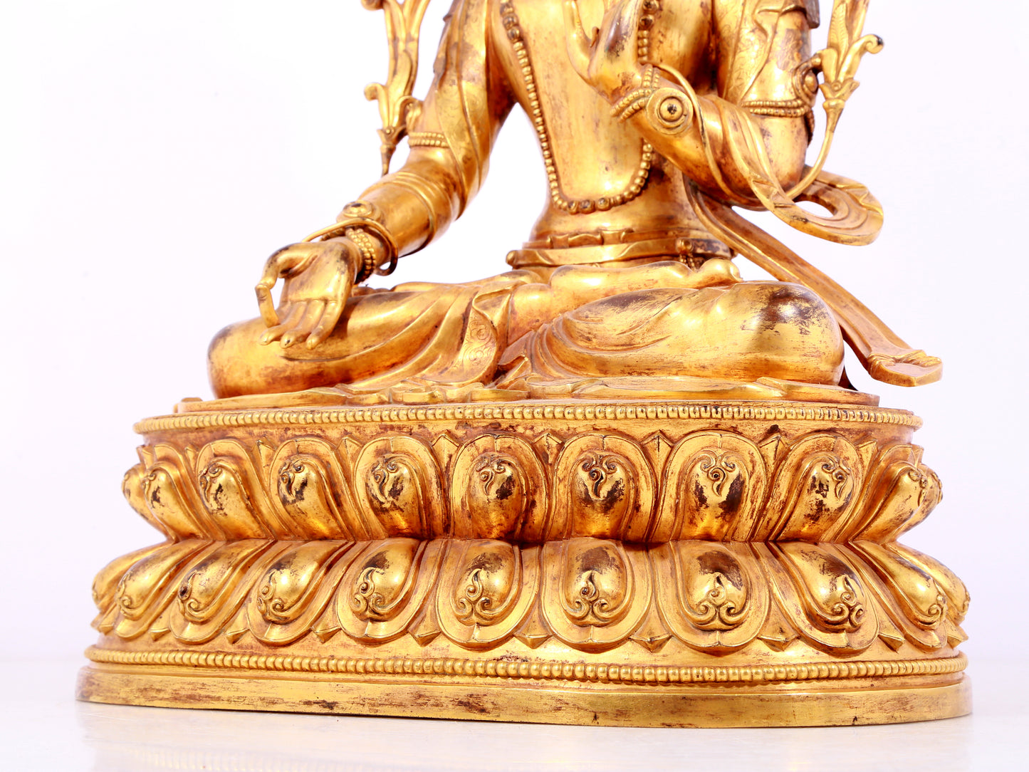 A solemn gilt bronze statue of Bodhisattva