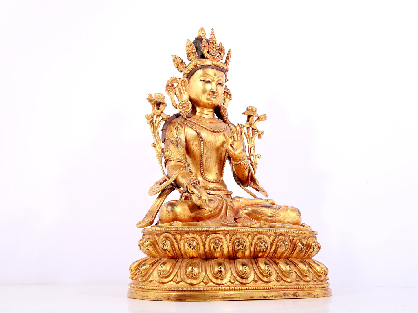 A solemn gilt bronze statue of Bodhisattva